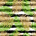 Tropical seamless pattern with monstera leaves and golden glitter texture. Royalty Free Stock Photo