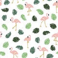 Tropical seamless pattern with pink flamingos and green palm leaves. Vector design. Royalty Free Stock Photo