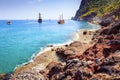 Tropical seascape with rocky beach. Blue sea and mountains landscape on bright clear sunny summer day Royalty Free Stock Photo