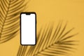 Tropical smartphone template. Blank smartphone with exotic palmtree shadow