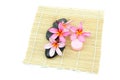 Tropical spa setting on bamboo mat Royalty Free Stock Photo