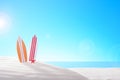 Tropical still life. Dawn on the sandy coast. Two surfboards on the beach Royalty Free Stock Photo