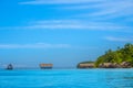 Tropical Stilt Huts and a Long Wooden Pier