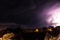 Tropical Storm clouds and Lightning at night on Bali island, Indonesia. Royalty Free Stock Photo