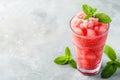 Tropical summer cocktail. Glass of watermelon slush. Red fruit cocktail or smoothies. watermelon smoothies. Red Slushie. Sweet