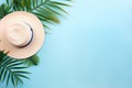 Tropical Summer Composition with Palm Leaves, Hat, and Coconut on Pastel Blue Background AI Generated Royalty Free Stock Photo