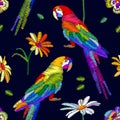 Tropical summer. Seamless vector pattern with parrots and flowers.