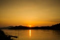 Tropical sunset above Mekong Laos Royalty Free Stock Photo
