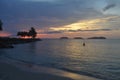 Tropical sunset over ocean and island Kota Kinabalu