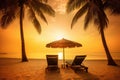 tropical sunset scenery two sun beds loungers at the beach Royalty Free Stock Photo