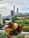 Tropical thai fruits with a view of Jomtien beach, Pattaya Thailand