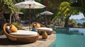 Tropical Tranquility - Beautiful beach with swimming pool, coconuts palm trees, rattan daybeds and umbrella in a tropical garden