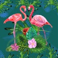 Tropical trendy seamless pattern with pink flamingos and mint green palm leaves Royalty Free Stock Photo