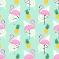 Tropical trendy seamless pattern with pink flamingos, pineapples and palm leaves on mint green background.