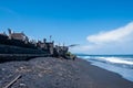 Tropical unusual exotic beach with black volcanic sand, blue sky with clouds. Nobody. Kusamba beach, Bali, Indonesia Royalty Free Stock Photo