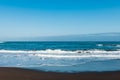 Tropical unusual exotic beach with black volcanic sand. Puerto de la Cruz, Tenerife, Spain Royalty Free Stock Photo