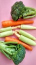 Tropical vegetables consist of green broccoli, baby corn and carrots