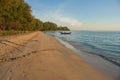 Tropical view of sea and fishing boats with sunset light at Chao Lao Beach. Royalty Free Stock Photo