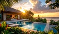 Tropical villa with infinity pool and ocean sunset with dramatic clouds vacation Royalty Free Stock Photo