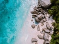 Tropical white beach at Praslin island Seychelles, happy Young couple man and woman during vacation Holiday at the beach Royalty Free Stock Photo