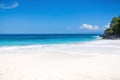 Tropical white sand beach and blue ocean with crystal water in Bali Royalty Free Stock Photo