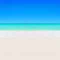 Tropical white sandy beach and turquoise clear ocean water background