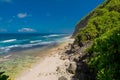 Tropical wild beach in Bali. Sandy beach and ocean Royalty Free Stock Photo