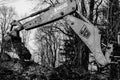 Trostyanets, Ukraine December 20, 2019: excavator digging soil in forest
