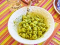 Trottole al Pesto, typical pasta of Campania, on a rustic presentation.