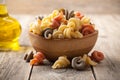 Trottole pasta in a wooden bowl Royalty Free Stock Photo
