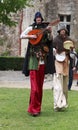 Troubadours on stilts Royalty Free Stock Photo