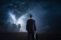 Trouble ahead, businessman standing in front of a stormy sky Royalty Free Stock Photo