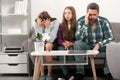 Trouble couple with unhappy child teenager discussing problems in worry family. Conflicts marital couple with kids