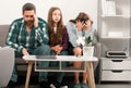 Trouble couple with unhappy child teenager discussing problems in worry family. Conflicts marital couple with kids