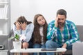 Trouble couple with unhappy child teenager discussing problems in worry family. Conflicts marital sad couple with kids