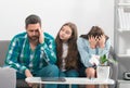 Trouble couple with unhappy child teenager discussing problems in worry family. Conflicts marital sad couple with kids