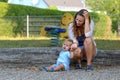 Troubled stressed young mother with her baby son Royalty Free Stock Photo