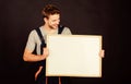 Troubleshoot and fix faulty electrical switches. Repairman engineer hold whiteboard copy space. Handsome repairman. Man Royalty Free Stock Photo