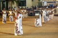 A troupe of female musicians perform during the Kataragama Festival in Sri Lanka. Royalty Free Stock Photo