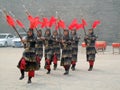Troupe of soldiers in historical military outfit