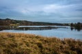 Trout fish farm at Kendoon Loch at sunset in winter, Scotland