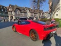 Trouville, France - March 20, 2022: Ferrari car on the city street in front of the casino
