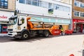 Trowbridge Wiltshire June 28th 2019 A truck driver using the controls to life a skip of building waste onto the lorry