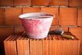 Trowel, bucket and bricks Royalty Free Stock Photo