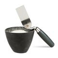 Trowel with bucket of filler