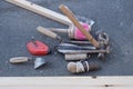 Various masonry and brickwork tools being used on a construction site