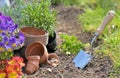 Trowel planting in the dirt in a garden Royalty Free Stock Photo