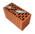 Trowel with red brick.