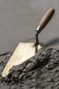 Trowel with wet concrete floor Royalty Free Stock Photo