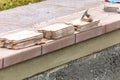 Trowels and New Tile At Pool Construction Site Royalty Free Stock Photo